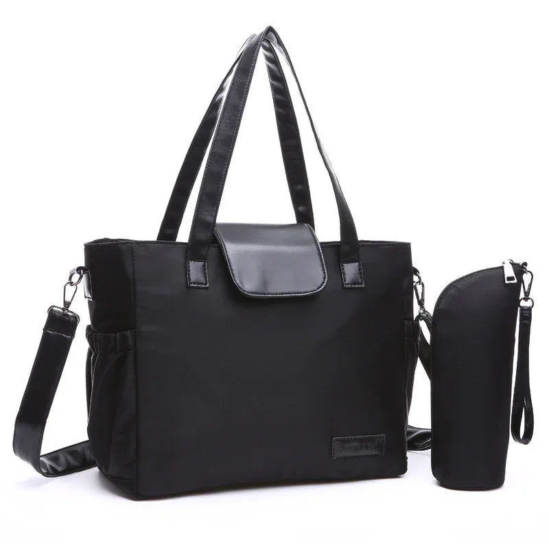 Sac à langer tendance, durable et imperméable avec pochette de rangement