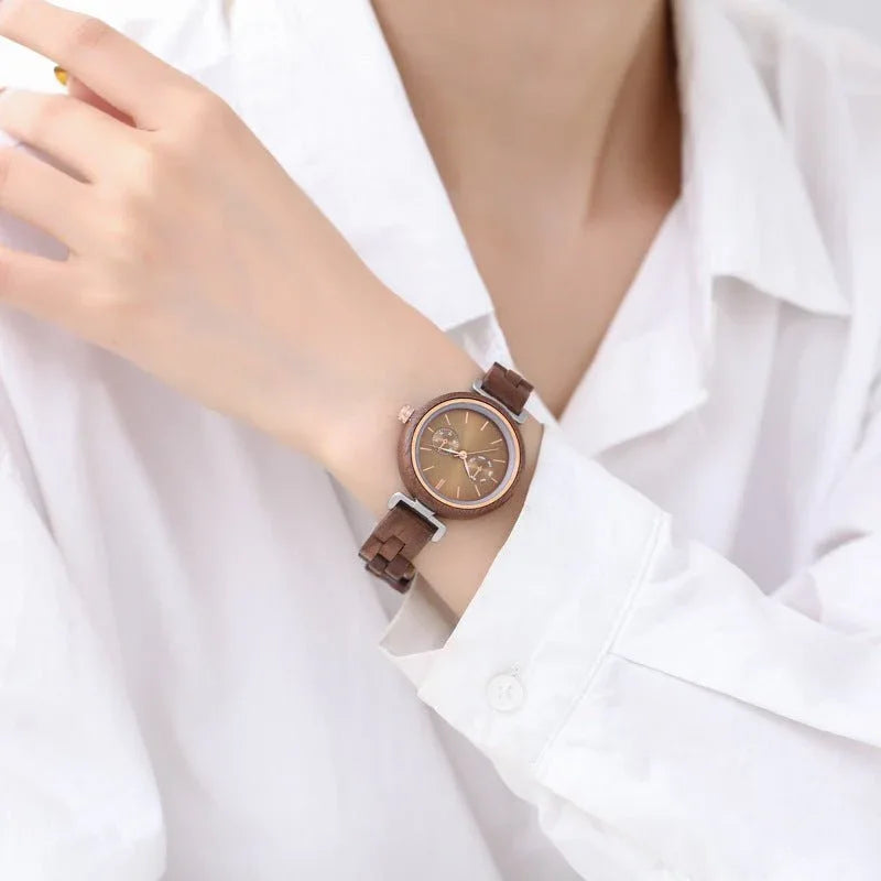 Montre ronde à quartz analogique en bois d'ébène pour femmes