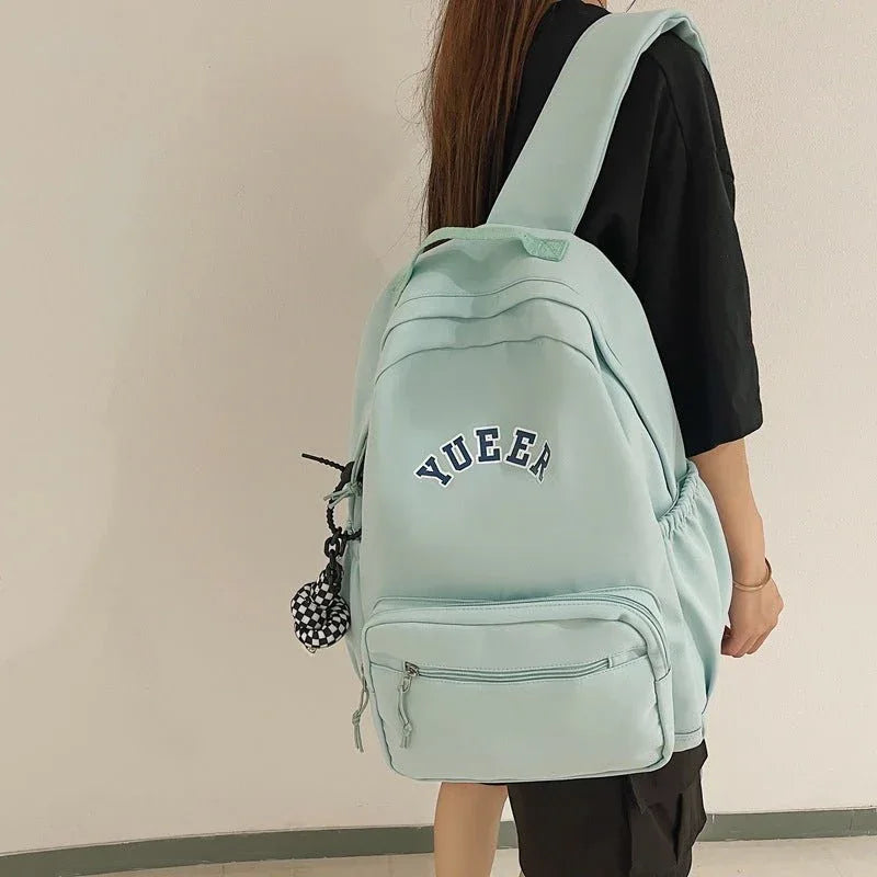 Sac à dos simple unisexe pour l'école ou le travail avec plusieurs poches