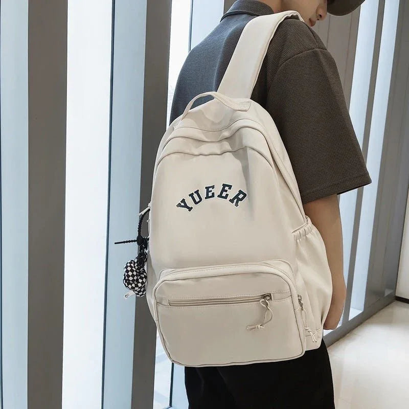 Sac à dos simple unisexe pour l'école ou le travail avec plusieurs poches