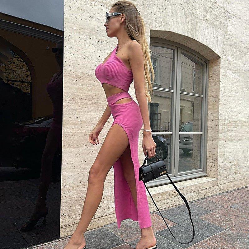 Ein schulterfreies Crop Top mit hoch tailliertem Aushöhlungsrock, eng anliegender zweiteiliger Damen-Kleidungsset