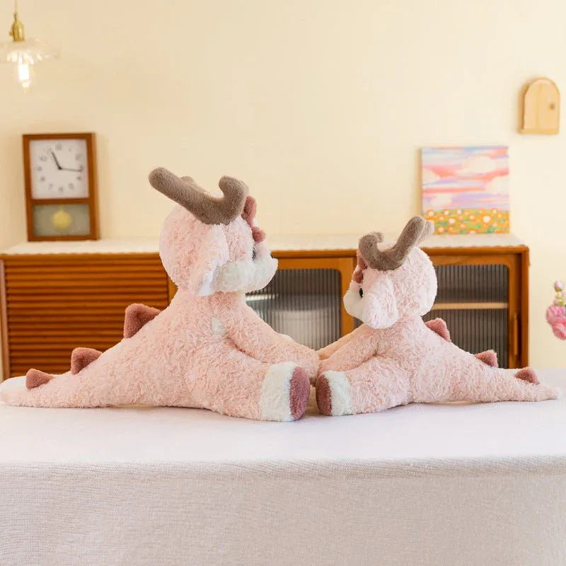 Jouets en peluche rose clair doux et mignons