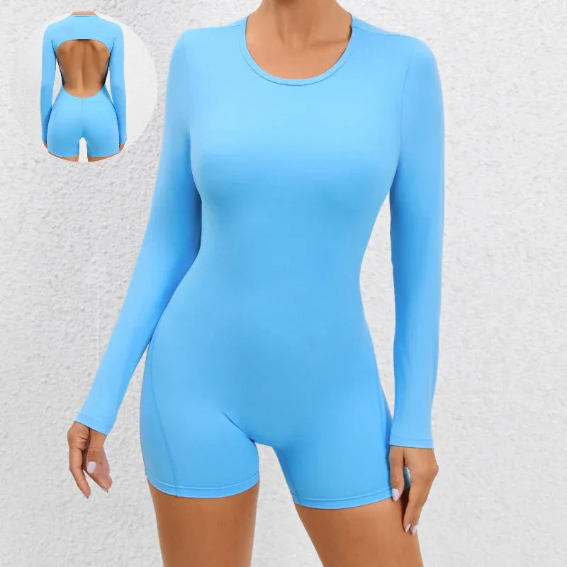 Combinaison de sport moulante à manches longues et dos ouvert pour femme